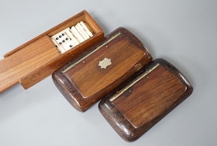 Two carved wood snuff boxes and a cased bone domino set